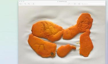 An image of ripped and punctured orange pill on a white background.