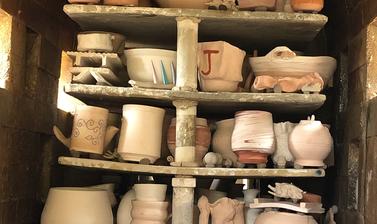 Shelves filled with jars and pots