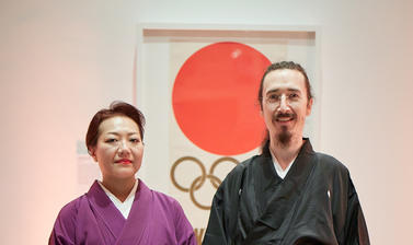 Photo of two musicians stood in traditional Japanese dress.