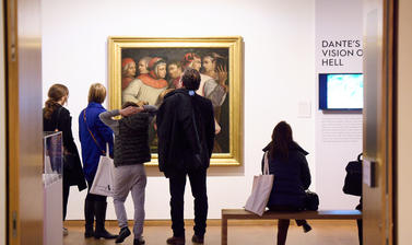 People looking at a painting