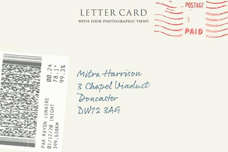 Image of the front of a letter with hand written name and address, postal stamp and barcode