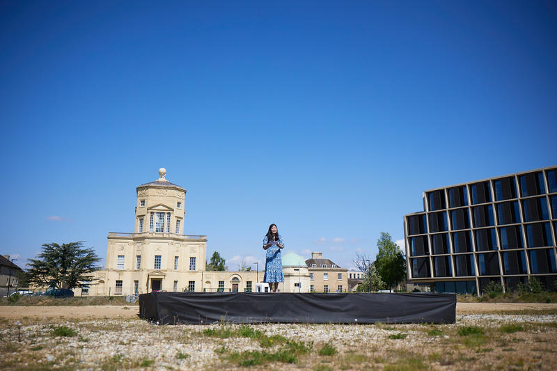 Jenny Wong sot from a distance on the Scwarzman Centre site on a sunny day
