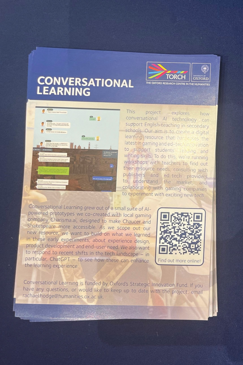 Images of some 1 page leaflets about Conversational Learning on a blue tablecloth