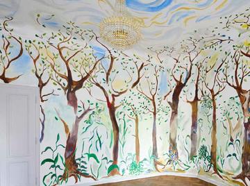 White room with trees painted