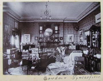 A black and white photograph of the boudoir at Tyntesfield