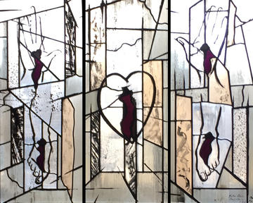The North Window of Nuffield College's Chapel depicts the Five Wounds of Christ, with the feet, hands and heart isolated, drawn in outline with the only colour being the gashes of blood. 