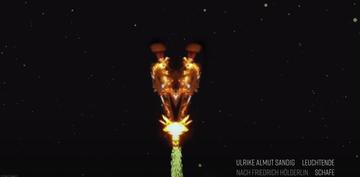 Still from video showing a person mirrored, acting and looking like a rocket taking off against black background