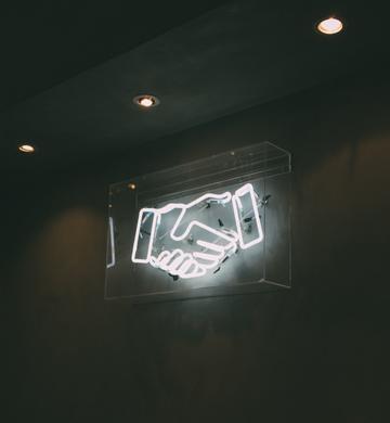 Neon sign handshake image