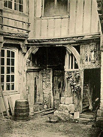A Courtyard at Abbeville photographed by John Ruskin in 1858, image depicting an archway entrance