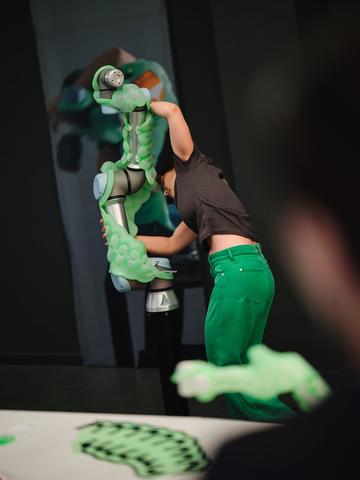 Dancer with a robotic arm