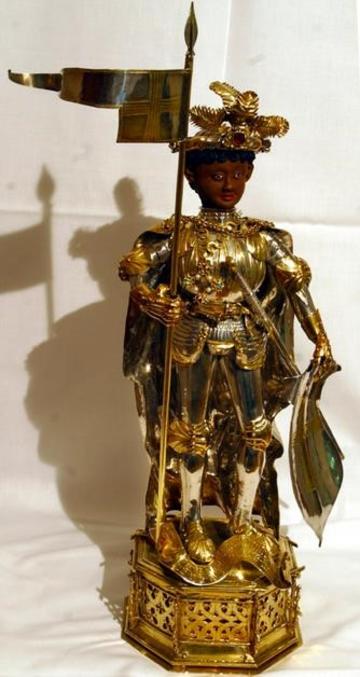 gold and wood statuette of St Maurice in armour