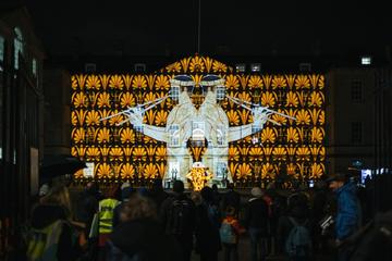 Lights projected onto the front of the Radcliffe Humanities Building