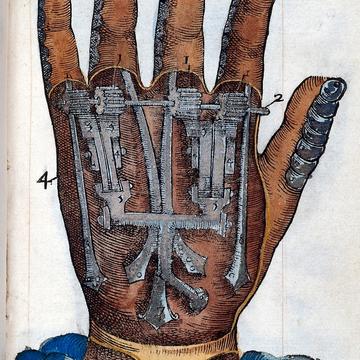 A cross section image of a hand showing steel for hands and cogs to move them