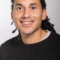 adam elliott cooper headshot