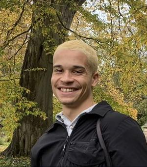 man smiling at camera at the part