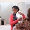afterbirth rehearsal - image of woman holding baby