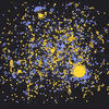 black background with explosion of blue and yellow dots