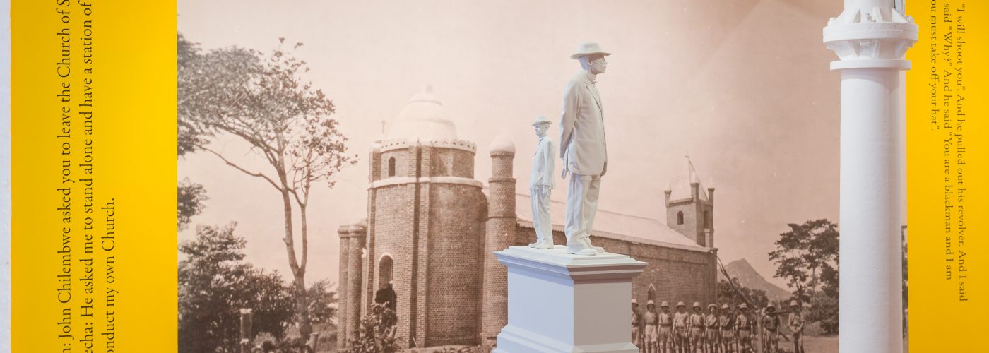 Image depicts the cast of two statues of different height on a plinth